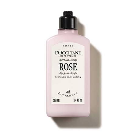 A bottle of L'Occitane France Rose body lotion with a black cap.