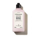 A bottle of L'Occitane France Rose body lotion with a black cap.
