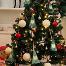 A beautifully decorated Christmas tree adorned with ornaments, lights, and tinsel, creating a festive atmosphere.