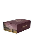 A burgundy-colored box with a picture of a field and a cow on it, along with the text "LANOCRÉME" printed on it.