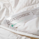 a close-up view of a white label with text and logos, likely associated with a product or brand.