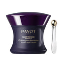 A purple jar of Payot Paris Supréme Youth Eye Cream with a gold-colored scoop, placed next to it.
