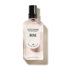 A bottle of L'Occitane en Provence Rose eau de toilette.