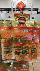 A display of nut bars in a store, with a clear plastic bag holding the products.