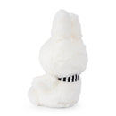 A white stuffed bunny toy with a black and white striped collar.